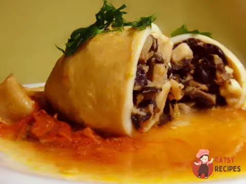 Кальмари. фаршировані грибами