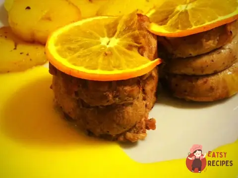 Медальйони з телятини з апельсиновим соусом