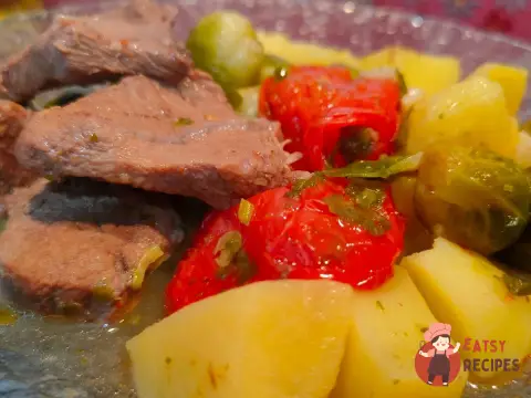 Яловичина з овочами тушкована у пиві