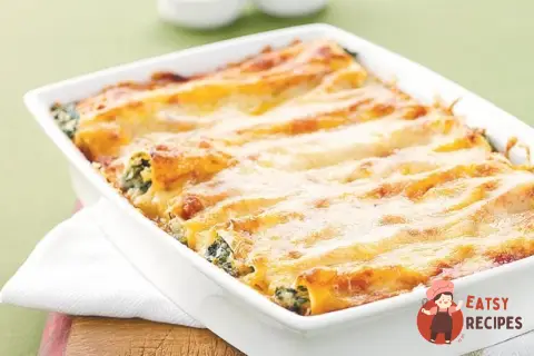 Каннеллоні паста з овочами з сиром і соусом бешамель