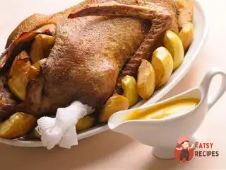 Качка з яблуками та спеціями