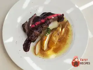 Качка магре з малиновим соусом