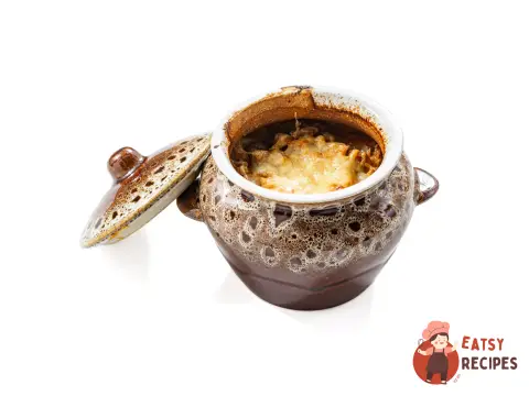 Печеня з курки з грибами в горщиках