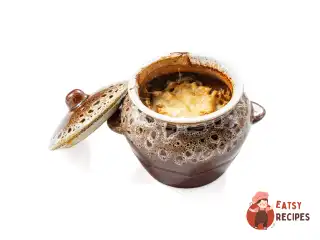 Печеня з курки з грибами в горщиках