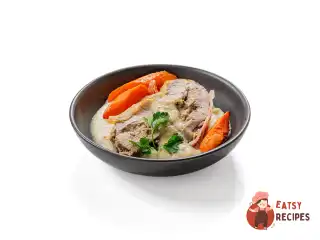 Фарширована свиняча шия з яблучно-цибулевим соусом