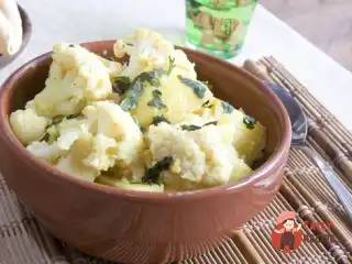 Цвітна капуста з вершковим маслом та петрушкою