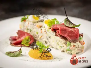 Російський салат з телятиною та ікрою