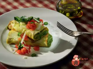 Каннеллоні з таледжо, спаржею та волоськими горіхами