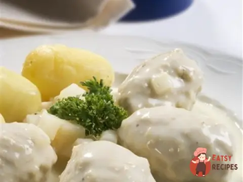 М'ясні тефтелі з рисом та білим соусом