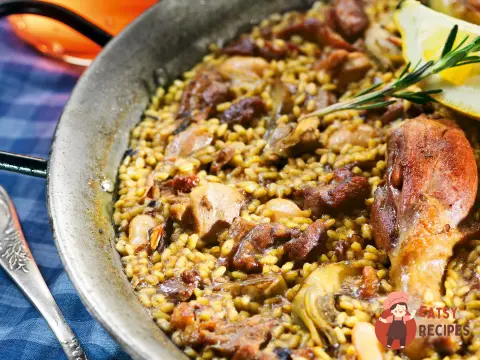 Паелья з качкою та артишоками