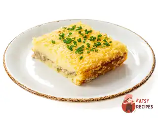 Картопляна запіканка з печінкою тріски