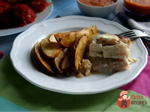 Пангасіус запечений з яблуками та корицею у вершках.