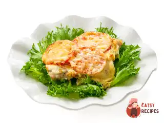 М'ясо по-французьки з помідорами в духовці