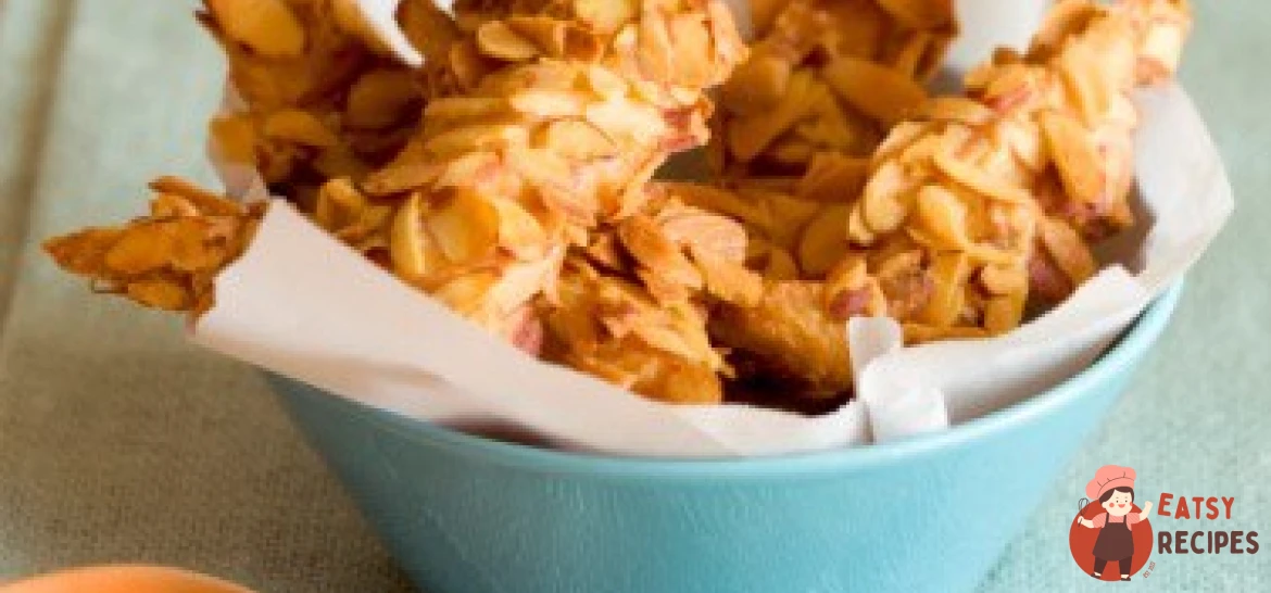 Курячі шматочки в паніруванні з мигдалю з коричневим рисом