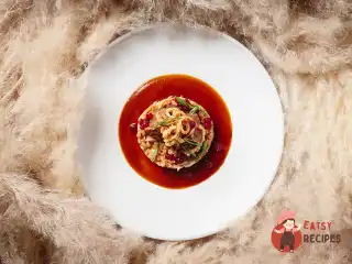 Томлений ягня з полбою та грибами