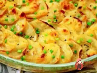 Картопляна запіканка з оселедцем (Калалаатіко)