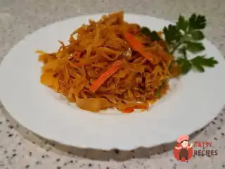 Тушкована капуста