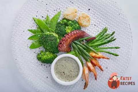 Теплий салат із морепродуктів із зеленими овочами від Жеремі Урюті