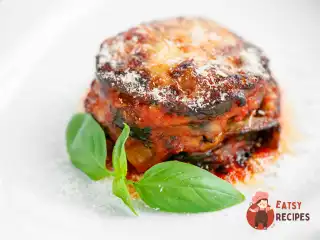 Парміджану з сиром моцарелла та пармезаном