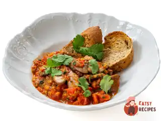 Куряча печінка з помідорами
