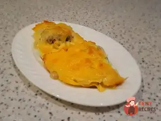 Хек зі сметаною та сиром у духовці