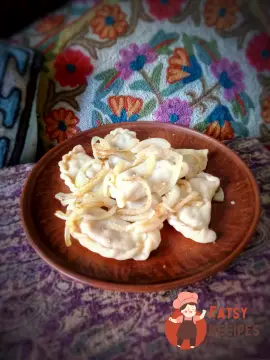 Вареники з капустою та цибулею