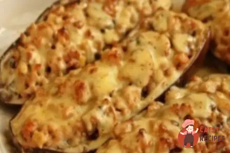 Баклажани, фаршировані грибами та фаршем