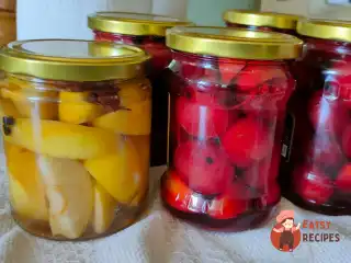 Мариновані сливи з яблуками на зиму