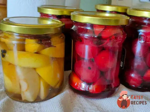 Мариновані сливи з яблуками на зиму