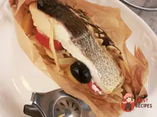 Нельма з овочами, запечена у пергаменті