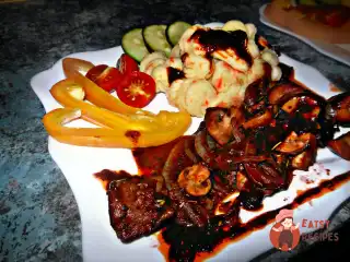 Півень у вині (Coq Au Vin)