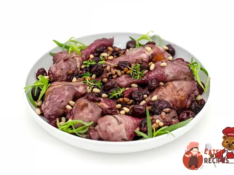 Курячі гомілки з вишнею та кедровими горішками