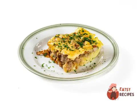 Картопляна запіканка з лисичками та куркою