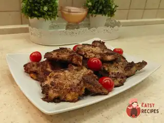 Свинині відбивні в соєвому соусі