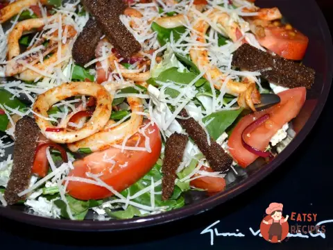 Салат з морськими гадами та грінками з бородинського хліба