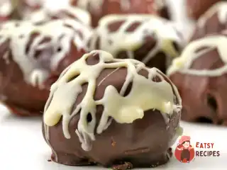 Кокосово-горіхові цукерки у темному шоколаді