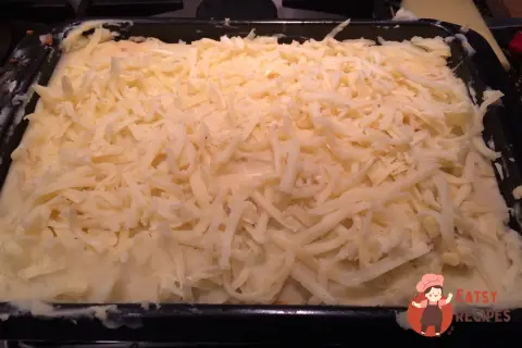 Картопляна запіканка з чеддером з італійськими нотками