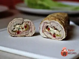 Курячий рулет з начинкою із сиру, бекону та перцю