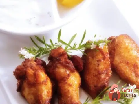 Смажені курячі крильця з медом та соєвим соусом