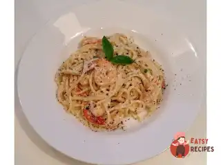 Паста з креветками у вершково-сирному соусі з італійськими травами