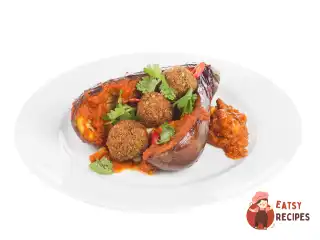 Запечений баклажан із фалафелем