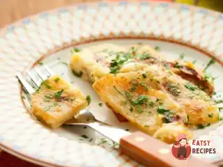 Закуска з цукіні, шинки, базиліка та рикотти