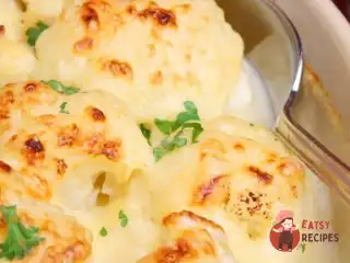 Золота цвітна капуста з часником та пармезаном.