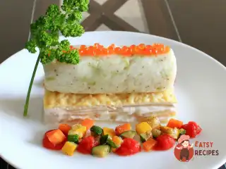 Рибний мус з гратеном дофіне, овочами та томатним кулі
