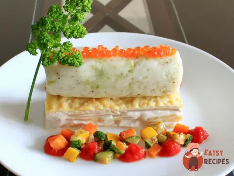 Рибний мус з гратеном дофіне, овочами та томатним кулі
