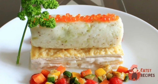 Рибний мус з гратеном дофіне, овочами та томатним кулі