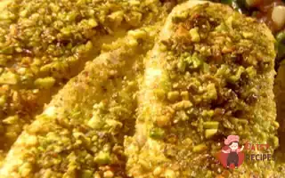 Дорада У Фісташковій Скоринці З Мангольдом, Вареною Шинкою, Сиром Горгонзолу Та Кедровими Горішками