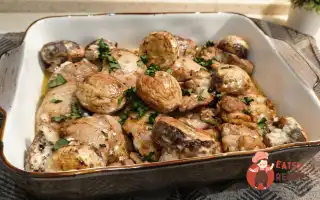 Курячі стегна в духовці з шампіньйонами