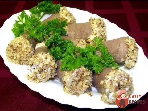 Рулетики з язика з грибами та волоськими горіхами