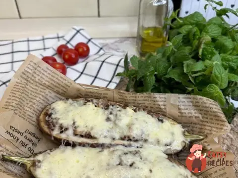 Баклажани з фаршем та сиром